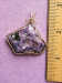 Thumbnail 03110005.jpg: ITEM # CH-50, $90.00, BEAUTIFUL purple charoite cab set in a gold filled wire wrapped pendant.� 