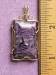 Thumbnail 03110008.jpg: ITEM # CH-52, $85.00, BEAUTIFUL purple charoite cab set in a gold filled wire wrapped pendant.� 