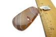 Item #LagunaAG1, Price $90.00 Large and beautiful Laguna Agate with a druzy quartz center. The agate bandng on this stone is stunning! Bead is 45mm long by 24mm wide. Bead is drilled at the narrow part of the stone and drill hole size is about 1.5 mm.