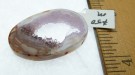 Item #Geodesl2, Price $50.00 Beautiful geode slice. Beautiful amethyst crystals line the inside of this geode slice. Bead is 36mm long by 22mm wide. Bead is not drilled but you can loop silk, leather or your choice through the open bead and suspend for a beautiful pendant.