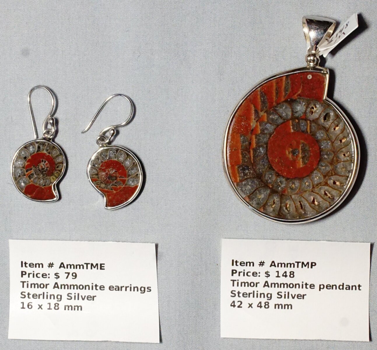 Scaled image AMMTME.JPG: Item # AmmTME - Timor Ammonite earrings $79
Itme # AmmTMP - Timor Ammonite pendant $148� 