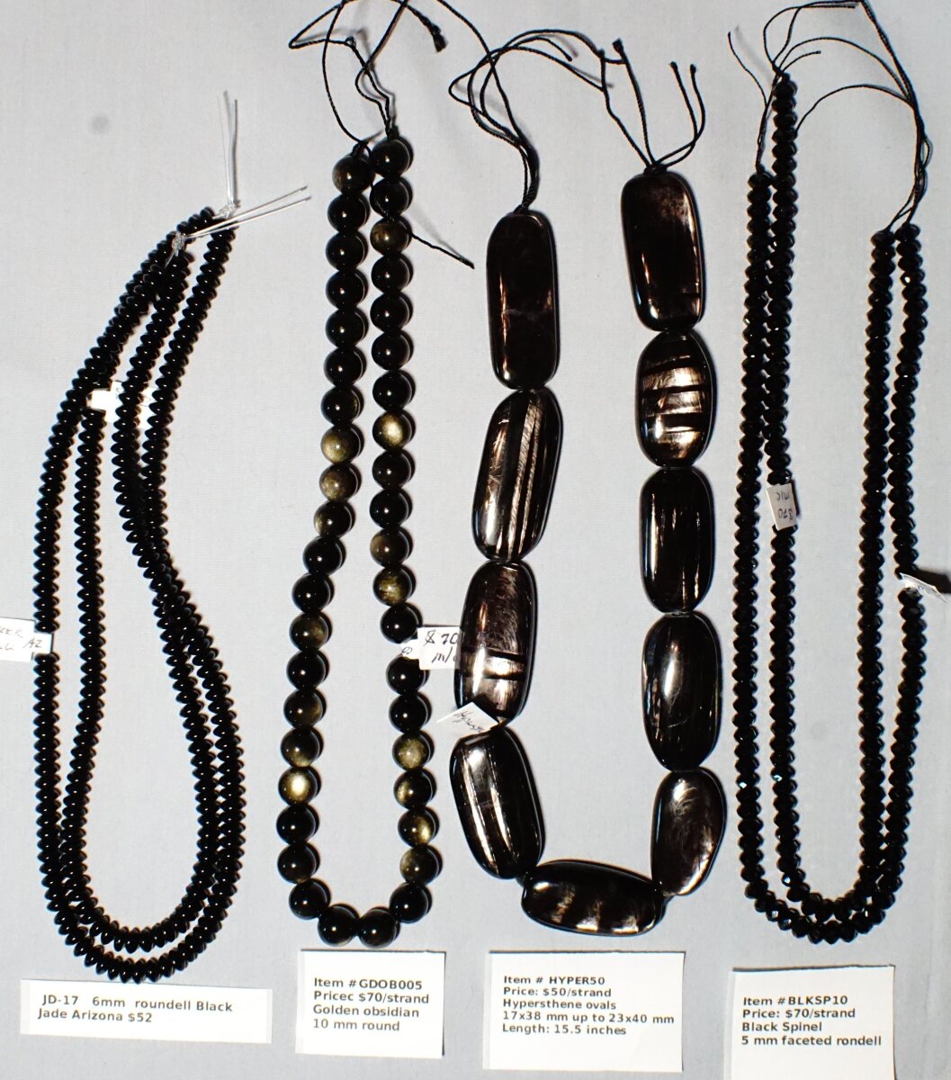 Scaled image BLJD-OBS-HYP-SPIN.JPG: Item # JD-17 6mm Black Jade
Item # GDOB005 - 10 mm golden obsidian $70/strand
Item # HYPER50-Hypersthene ovals
Item # BLKSP10 - 5 mm Balck spinel $70/strand� 