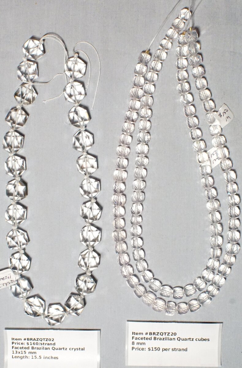 Scaled image BRAZQTZ.JPG: Item # BRAZQTZ02 - Brazilian Quartz, 13x15 mm faceted, $160/strand
Item # BRZQTZ20 - Brazilian Quartz, 8 mm faceted cubes, $ 150/strand� 