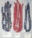 Thumbnail CHAL-RHODO-DUMOR.JPG: Item # BLCHAL40-Blue Chalcendony chips, $40/strand
Item # RHODO5-10 mm Rhodonite round, $225/strand
Item # DUMQTZ06-Dumorterite in Quartz, 6 mm, $265/strand 