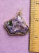 Item # CH50 Price $95.00 Russian Charoite cab hand wire wrapped in 14 kt gold filled wire.