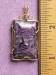 Item # CH52 Price $90.00 Russian Charoite cab hand wire wrapped in 14 kt gold filled wire.