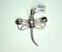 Item #P30. Price $45.00. Sterling silver dragonfly pendant set with 3 faceted garnet stones. Length 46mm and 37mm wide.