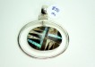 Item P25. Price $70. Native American inlaid pendant. Tiger Eye, Jasper, black onyx, and synthetic opal set in sterling silver. The pendant hangs freely from the surrounding sterling ring.