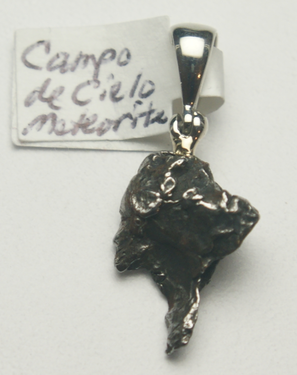 Scaled image Meteorite.JPG: Item # 201594, $ 55.00. Sterling Silver. Length 30 mm from top of bail. Width 14 mm.� 