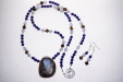 Thumbnail DSC00158.JPG: Bolder Opal drop, Lapis, Quartz, Blue Chalcedony, Smoky Quartz, Bali spacers, and Sterling Silver findings and clasp. 